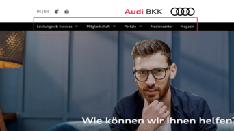 Die Startseite der Audi BKK, dabei ist die Navigationsleiste in einem roten Rahmen markiert.